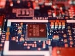 Semiconductor chips are seen on a circuit board of a computer in this illustration picture. (Representative Image/Reuters File Photo) Semiconductor chips are seen on a circuit board of a computer in this illustration picture. (Representative Image/Reuters File Photo)