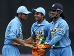 Rahul Dravid, Suresh Raina, and MS Dhoni during an ODI in 2006 Rahul Dravid, Suresh Raina, and MS Dhoni during an ODI in 2006