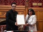 Karan Johar being honoured at the UK Parliament. Karan Johar being honoured at the UK Parliament.