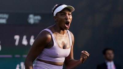 Venus Williams of the US celebrates defeating Italy's Camila Giorgi on day one of the Birmingham Classic tournament at Edgbaston Priory Club (AP)