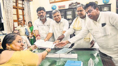 Congress leader Jagadish Shettar files nomination papers for the upcoming state legislative assembly bypolls. (ANI)