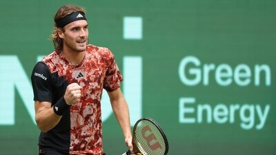 Stefanos Tsitsipas reacts during his first round tennis match against Gregoire Barrere at the Halle ATP Tour (AP)