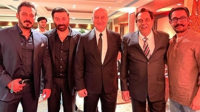 Anupam Kher poses with Salman Khan, Sunny Deol, Dharmendra and Aamir Khan. Anupam Kher poses with Salman Khan, Sunny Deol, Dharmendra and Aamir Khan.