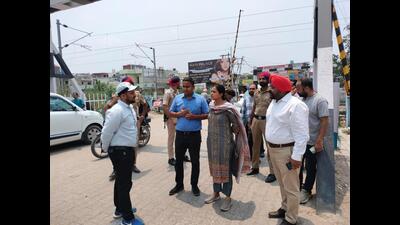 Mohali deputy commissioner Aashika Jain during her visit to Dhakoli, along with railway authorities, on Tuesday. (HT Photo)