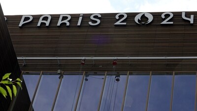 The logo of the Paris 2024 Olympics and Paralympics Games is seen on the Pulse building, the headquarters of the Paris 2024 Olympics organizing committee, as a police search is currently underway (REUTERS)