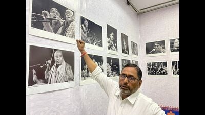 Photographer and Sangeet Natak Akademi awardee Rakesh Sinha gazing at his collection a day before the ‘Swar Virasat’ exhibition. (HT Photo) Photographer and Sangeet Natak Akademi awardee Rakesh Sinha gazing at his collection a day before the ‘Swar Virasat’ exhibition. (HT Photo)