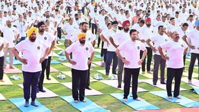 Punjab chief minister Bhagwant Mann attending the “CM di Yogshala” event in Jalandhar. (HT Photo)