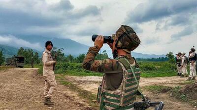 Security personnel patrol a violence-hit area in Bishnupur. (PTI) Security personnel patrol a violence-hit area in Bishnupur. (PTI)