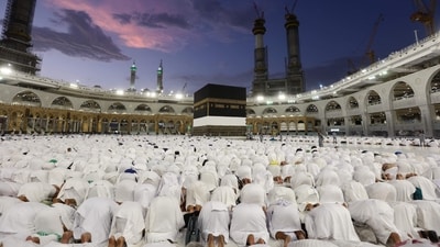 Muslim pilgrims perform prayers around the Kaaba, Islam's holy shrine, at the Grand Mosque in the Saudi holy city of Mecca ahead of the Hajj pilgrimage. Hajj 2023: Date, history, significance and Ihram to Eid-ul-Adha rituals of Muslims pilgrimage to Mecca in Saudi Arabia (Photo by Abdel Ghani BASHIR / AFP) Muslim pilgrims perform prayers around the Kaaba, Islam's holy shrine, at the Grand Mosque in the Saudi holy city of Mecca ahead of the Hajj pilgrimage. Hajj 2023: Date, history, significance and Ihram to Eid-ul-Adha rituals of Muslims pilgrimage to Mecca in Saudi Arabia (Photo by Abdel Ghani BASHIR / AFP)