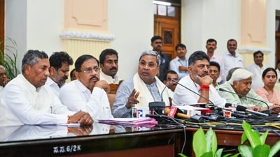 Karnataka chief minister Siddaramaiah with his deputy DK Shivakumar and other cabinet colleagues. (ANI) Karnataka chief minister Siddaramaiah with his deputy DK Shivakumar and other cabinet colleagues. (ANI)