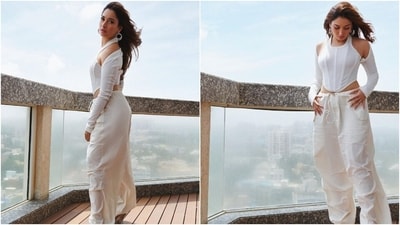 Lastly, Tamannaah accessorised the all-white look with silver block heels, statement rings, and triple hoop silver earrings. Open centre-parted wavy tresses, feathered brows, mascara on the lashes, subtle eye shadow, glossy blush pink lip shade, beaming highlighter, and rouged cheeks completed the glam picks. (Instagram) Lastly, Tamannaah accessorised the all-white look with silver block heels, statement rings, and triple hoop silver earrings. Open centre-parted wavy tresses, feathered brows, mascara on the lashes, subtle eye shadow, glossy blush pink lip shade, beaming highlighter, and rouged cheeks completed the glam picks. (Instagram)