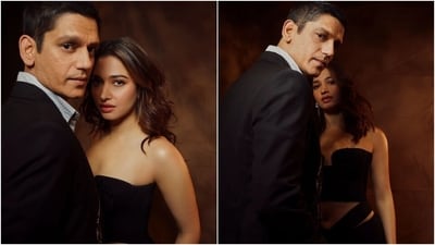 The pictures show Vijay and Tamannaah twinning in sensuous black ensembles. While Vijay looked dapper in a printed light blue button-down shirt, black blazer and matching pants, Tamannaah stunned in a black corset blouse and matching pantsuit. (Instagram) The pictures show Vijay and Tamannaah twinning in sensuous black ensembles. While Vijay looked dapper in a printed light blue button-down shirt, black blazer and matching pants, Tamannaah stunned in a black corset blouse and matching pantsuit. (Instagram)