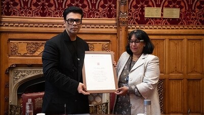 Karan Johar being honoured at the UK Parliament. Karan Johar being honoured at the UK Parliament.