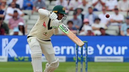 Usman Khawaja followed up his first innings century with a gritty half century and anchored much of the chase after the first session was washed out. He ended up winning the player of the match.&nbsp;(AFP)