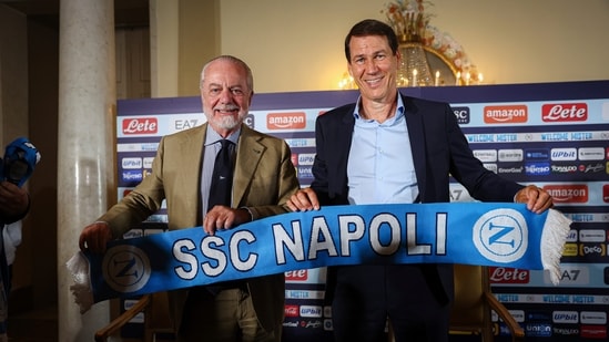 Rudi Garcia, right, new head coach of SSC Napoli and the club's president Aurelio De Laurentiis, left (AP)