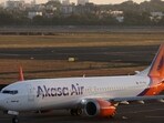 An Akasa Air passenger aircraft taxis on the tarmac at Chhatrapati Shivaji International Airport in Mumbai, India.