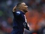 PSG's Kylian Mbappe celebrates after scoring his team's opening goal during the French League One soccer match between Paris Saint-Germain and Lorient, at the Parc des Princes stadium in Paris, Sunday, April 30, 2023.AP/PTI(AP04_30_2023_000404A) PSG's Kylian Mbappe celebrates after scoring his team's opening goal during the French League One soccer match between Paris Saint-Germain and Lorient, at the Parc des Princes stadium in Paris, Sunday, April 30, 2023.AP/PTI(AP04_30_2023_000404A)