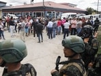 Police guard the entrance to the women's prison in Tamara, on the outskirts of Tegucigalpa, Honduras, Tuesday, June 20, 2023. A riot at the women's prison northwest of the Honduran capital has left at least 41 inmates dead, most of them burned to death, a Honduran police official said.