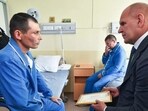 Alexander Karelin, senator of the federation council, awards Andrei Kravtsov with certificate for bonus of 1 million roubles for destruction of Leopard tank.