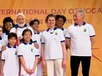 Prime Minister Narendra Modi, Annelies Richmond pose for group photographs with children during the 9th International Day of Yoga celebrations at the UN headquarters, in New York, Wednesday. Prime Minister Narendra Modi, Annelies Richmond pose for group photographs with children during the 9th International Day of Yoga celebrations at the UN headquarters, in New York, Wednesday.