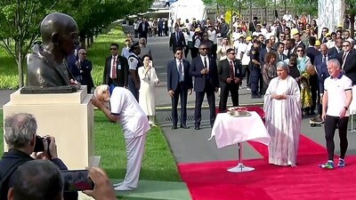 PM Modi paid tribute to the bust of Mahatma Gandhi ahead of the Yoga session . (ANI) PM Modi paid tribute to the bust of Mahatma Gandhi ahead of the Yoga session . (ANI)