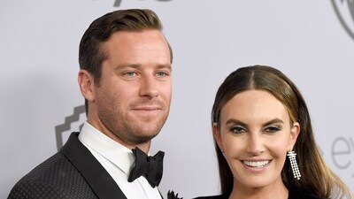 FILE - Armie Hammer, left, and wife Elizabeth Chambers arrive at the InStyle and Warner Bros. Golden Globes afterparty, Jan. 7, 2018, in Beverly Hills, Calif. Hammer has reached a divorce agreement with Chambers, nearly three years after she filed to end their marriage. Hammer's attorney filed documents in Los Angeles Superior Court on Tuesday, June 20, 2023, informing a judge that the actor and Chambers have come to terms over child custody, child support, spousal support and division of assets. (Photo by Chris Pizzello/Invision/AP, File) (Chris Pizzello/Invision/AP) FILE - Armie Hammer, left, and wife Elizabeth Chambers arrive at the InStyle and Warner Bros. Golden Globes afterparty, Jan. 7, 2018, in Beverly Hills, Calif. Hammer has reached a divorce agreement with Chambers, nearly three years after she filed to end their marriage. Hammer's attorney filed documents in Los Angeles Superior Court on Tuesday, June 20, 2023, informing a judge that the actor and Chambers have come to terms over child custody, child support, spousal support and division of assets. (Photo by Chris Pizzello/Invision/AP, File) (Chris Pizzello/Invision/AP)
