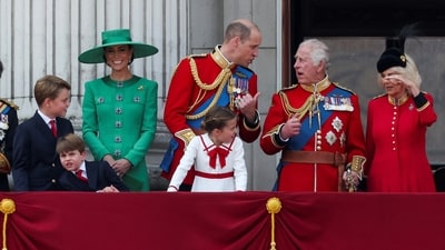 Britain's King Charles, Queen Camilla, Prince William, Catherine, Princess of Wales, Prince George, Princess Charlotte and Prince Louis appear on the balcony of Buckingham Palace. (Reuters)