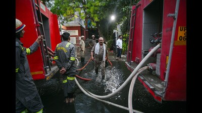Fire fighters work to douse the blaze at the factory in Hosiery Complex Phase 2 on Wednesday. (Sunil Ghosh/HT Photo) Fire fighters work to douse the blaze at the factory in Hosiery Complex Phase 2 on Wednesday. (Sunil Ghosh/HT Photo)