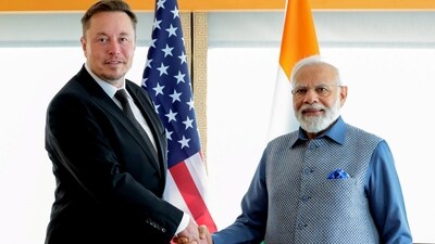 PM Modi in US: Narendra Modi meets Tesla and SpaceX CEO Elon Musk, in New York on first day of his inagural US state visit on Tuesday. (PTI) PM Modi in US: Narendra Modi meets Tesla and SpaceX CEO Elon Musk, in New York on first day of his inagural US state visit on Tuesday. (PTI)