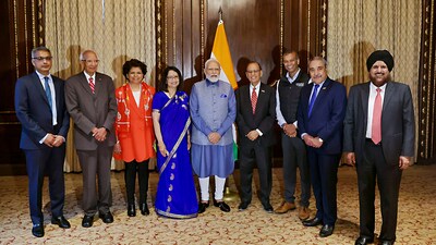 PM Modi in US: Prime Minister Narendra Modi poses for a group photograph during an interaction with a group of eminent US academics from diverse fields of agriculture, marketing, engineering, health, science & technology, in New York. (PTI) PM Modi in US: Prime Minister Narendra Modi poses for a group photograph during an interaction with a group of eminent US academics from diverse fields of agriculture, marketing, engineering, health, science & technology, in New York. (PTI)