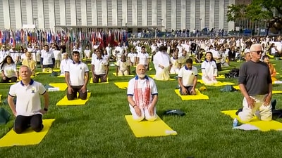 PM Modi takes part at the yoga session at UN Headquarters lawns in New York on the occasion of 9th International Yoga Day. (PTI) PM Modi takes part at the yoga session at UN Headquarters lawns in New York on the occasion of 9th International Yoga Day. (PTI)