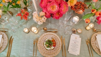 US State Dinner menu card: The first course, a marinated millet and grilled corn kernel salad with compressed watermelon and a tangy avocado sauce, that will be served at Thursday evening's State Dinner with India, is seen on a set table during a media preview, Wednesday, June 21, 2023, at the White House in Washington. (AP) US State Dinner menu card: The first course, a marinated millet and grilled corn kernel salad with compressed watermelon and a tangy avocado sauce, that will be served at Thursday evening's State Dinner with India, is seen on a set table during a media preview, Wednesday, June 21, 2023, at the White House in Washington. (AP)