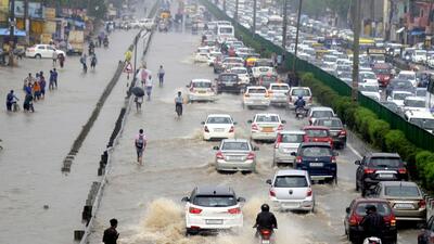 Vehicles wade through a waterlogged road near Narsinghpur village in Gurugram on Wednesday. (Parveen Kumar/ HT Photo) Vehicles wade through a waterlogged road near Narsinghpur village in Gurugram on Wednesday. (Parveen Kumar/ HT Photo)