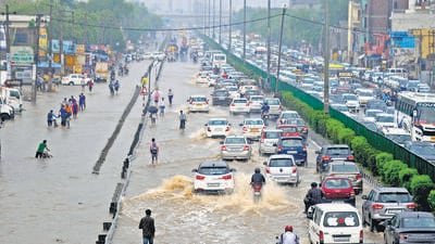 Vehicles wade through a waterlogged stretch on NH-48 near Narsinghpur village, in Gurugram on Wednesday. (Parveen Kumar/HT) Vehicles wade through a waterlogged stretch on NH-48 near Narsinghpur village, in Gurugram on Wednesday. (Parveen Kumar/HT)