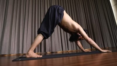 Downward Facing Dog (Adho Mukha Svanasana): Start on your hands and knees, then lift your hips up and back, forming an upside-down "V" shape with your body. Keep your hands shoulder-width apart and your feet hip-width apart. This pose stretches the hamstrings, calves, and shoulders.&nbsp; (File Photo (Grand Master Akshar))