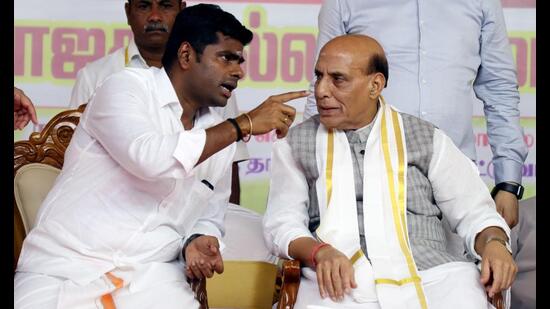 Defence Minister Rajnath Singh interacts with Tamil Nadu BJP President K.Annamalai during a public meeting in Tambaram near Chennai on Tuesday. (ANI)