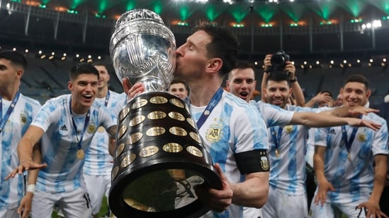 FILE - Argentina's Lionel Messi kisses the trophy after beating Brazil 1-0 in the Copa America final (AP)