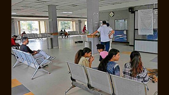 Visitors waiting at the sub-registrar office in Ludhiana on Wednesday. (Gurpreet Singh/HT)