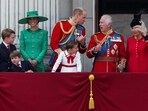 Britain's King Charles, Queen Camilla, Prince William, Catherine, Princess of Wales, Prince George, Princess Charlotte and Prince Louis appear on the balcony of Buckingham Palace.