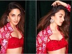Kiara Advani in red outfit for Satyaprem Ki Katha event with Kartik Aaryan. Kiara Advani in red outfit for Satyaprem Ki Katha event with Kartik Aaryan.