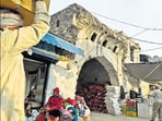 The street lies in Gurugram’s Sadar Bazar, adorned with the old Ghamand Sarai gateway.