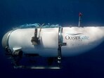 The Titan submersible, operated by OceanGate Expeditions to explore the wreckage of the sunken SS Titanic off the coast of Newfoundland, dives in an undated photograph. Titan: Earth's tallest peaks to suborbital space, extreme tourism exploits that tempt ultra-wealthy  
