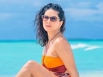 Sunny Leone in colourful swimsuit soaks up the sun at Maldives. 