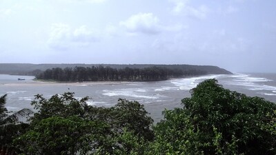 Goa, known for its stunning beaches and vibrant nightlife, takes on a different charm during the monsoons. The lush green landscapes, rain-washed beaches, and peaceful ambiance make it an ideal destination. Enjoy scenic drives along the coastal roads, witness the Dudhsagar Waterfall in its full glory, and savor freshly caught seafood at beachside shacks. (Pixabay) Goa, known for its stunning beaches and vibrant nightlife, takes on a different charm during the monsoons. The lush green landscapes, rain-washed beaches, and peaceful ambiance make it an ideal destination. Enjoy scenic drives along the coastal roads, witness the Dudhsagar Waterfall in its full glory, and savor freshly caught seafood at beachside shacks. (Pixabay)