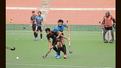 A match underway at Sector 42 Hockey Stadium on Thursday. (HT Photo) A match underway at Sector 42 Hockey Stadium on Thursday. (HT Photo)