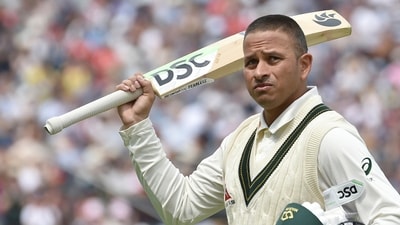 Australia's Usman Khawaja acknowledges the crowd as he walks off the pitch after being given out clean bowled by England's Ollie Robinson during day three of the first Ashes Test cricket match between England and Australia at Edgbaston, Birmingham, England, Sunday, June 18, 2023. Khawaja made 141 runs. (AP/PTI) (AP06_18_2023_000091A) (AP)