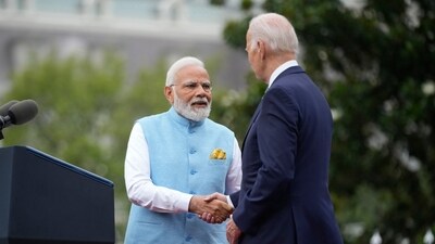US President Joe Biden and Prime Minister Narendra Modi shake hands during a State Arrival Ceremony on the South Lawn of the White House in Washington, Thursday. (AP) US President Joe Biden and Prime Minister Narendra Modi shake hands during a State Arrival Ceremony on the South Lawn of the White House in Washington, Thursday. (AP)