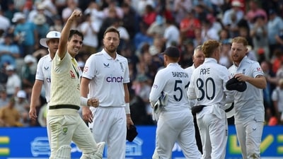 Australia captain Pat Cummins, left, celebrates after beating England during on day five of the first Ashes Test (AP) Australia captain Pat Cummins, left, celebrates after beating England during on day five of the first Ashes Test (AP)