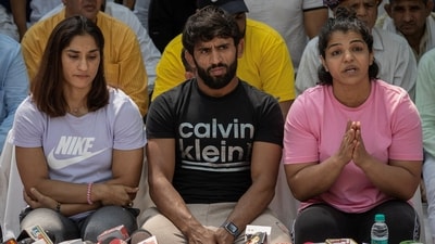 FILE PHOTO: Indian wrestlers Vinesh Phogat, Bajrang Punia, and Sakshi Malik address a news conference. (REUTERS)