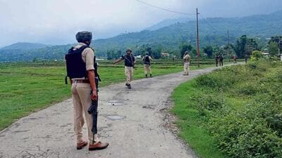Indian Army and police personnel patrol the Kanto Sabal village near Imphal. (AFP image) Indian Army and police personnel patrol the Kanto Sabal village near Imphal. (AFP image)
